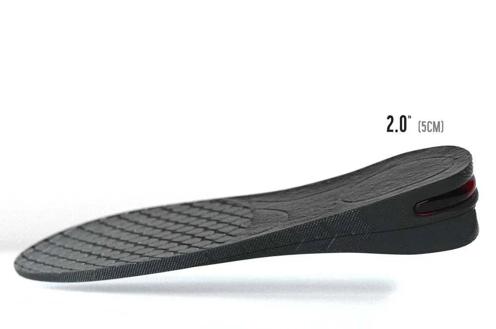 Height Boost Insoles are a black layered heel-lift insert with a textured cushioned top and discreet wedge profile.