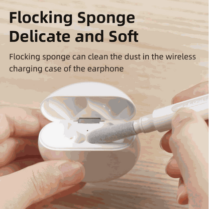 AirPod Cleaning Kit with a white-handled flocking sponge cleaning the white wireless earbud charging case.