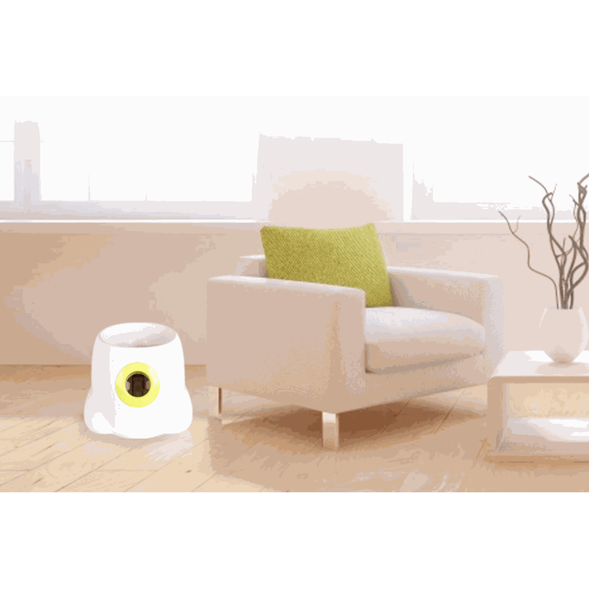 Automatic Ball Launcher for Dogs, a compact white plastic device with a bright yellow circular launch opening