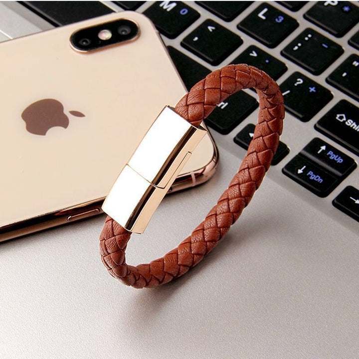 Charging Bracelet — Wearable Phone Charging Cable with a brown braided band and polished silver clasp.