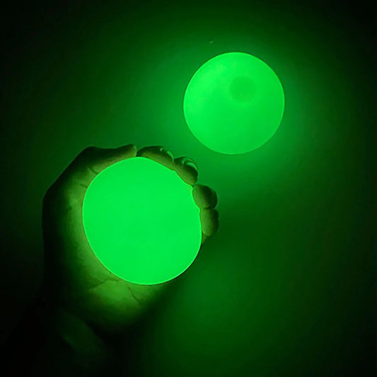 Sticky glow-in-the-dark balls that adhere to walls and ceilings for fun sensory play