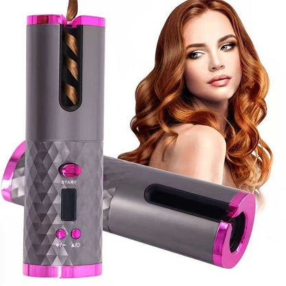 Portable Hair Curler with a gray textured body, bright pink accents, and a slot-style curling chamber for winding hair.