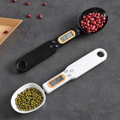 Digital precision scale spoon displaying weight in grams for accurate cooking and baking