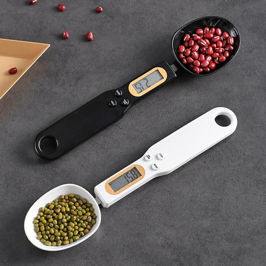 Digital precision scale spoon displaying weight in grams for accurate cooking and baking